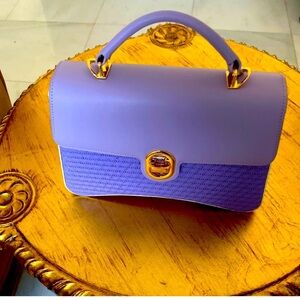 NWT 2 pockets Authentic Matmazel designed purple hand bag .